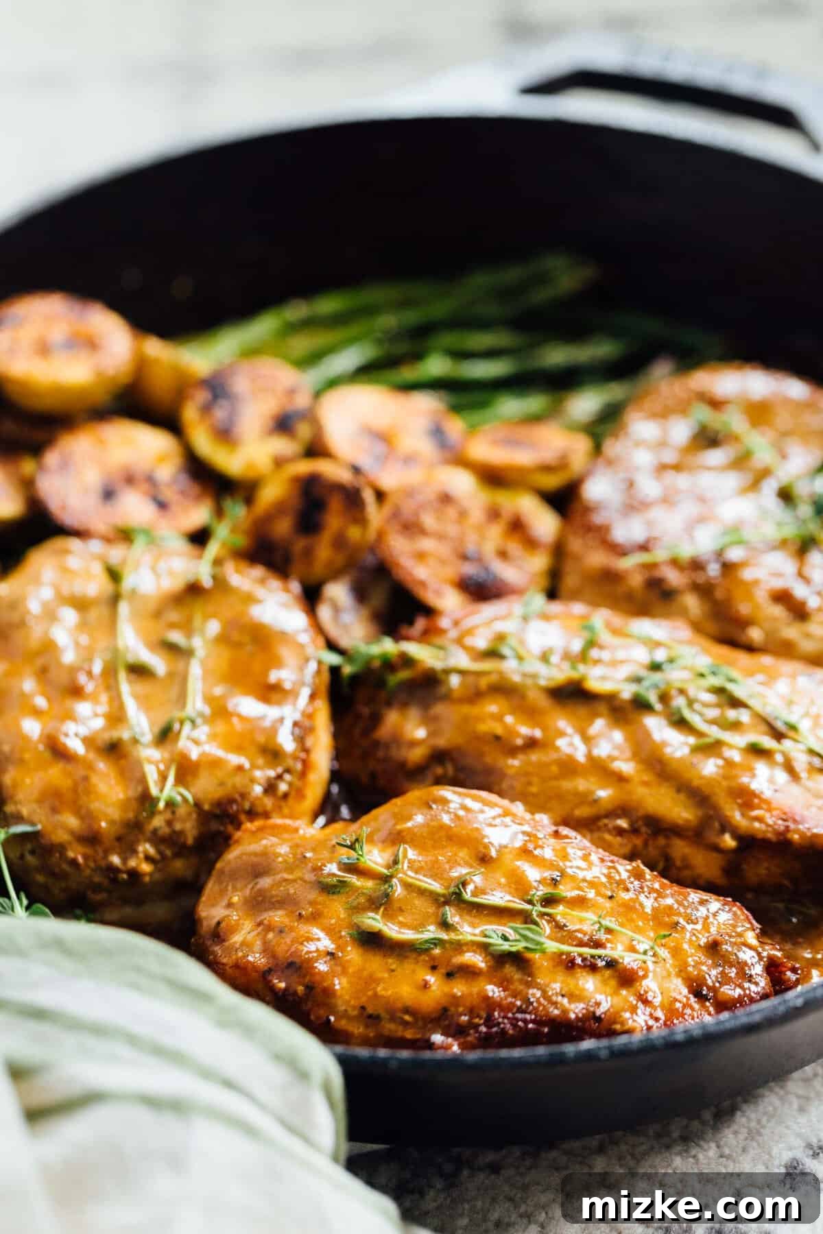 Apricot Balsamic Pork Chops: A Sweet and Tangy Skillet Dinner Juicy apricot balsamic pork chops glistening with sweet and tangy glaze, ready for a quick weeknight dinner. Discover this easy skillet dinner recipe now! #apricotbalsamic #apricot #porkchops #quickdinner #easydinner #skilletdinner