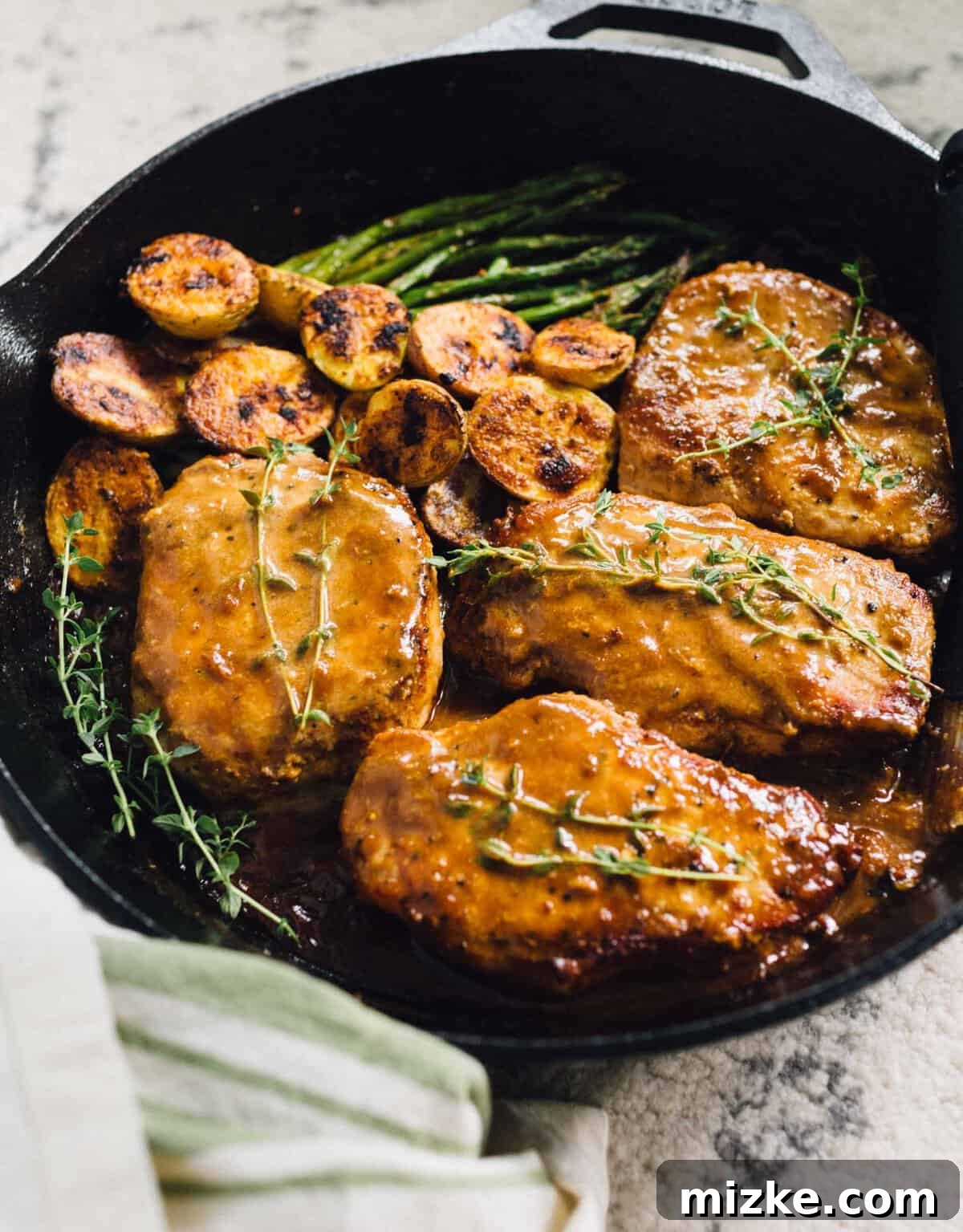 Key Ingredients for Apricot Balsamic Pork Chops Glaze Ingredients for apricot balsamic pork chops laid out, highlighting fresh thyme, minced garlic, smooth Dijon mustard, and the sweet apricot preserves. #apricotbalsamic #ingredients #recipeinspiration #homecooking