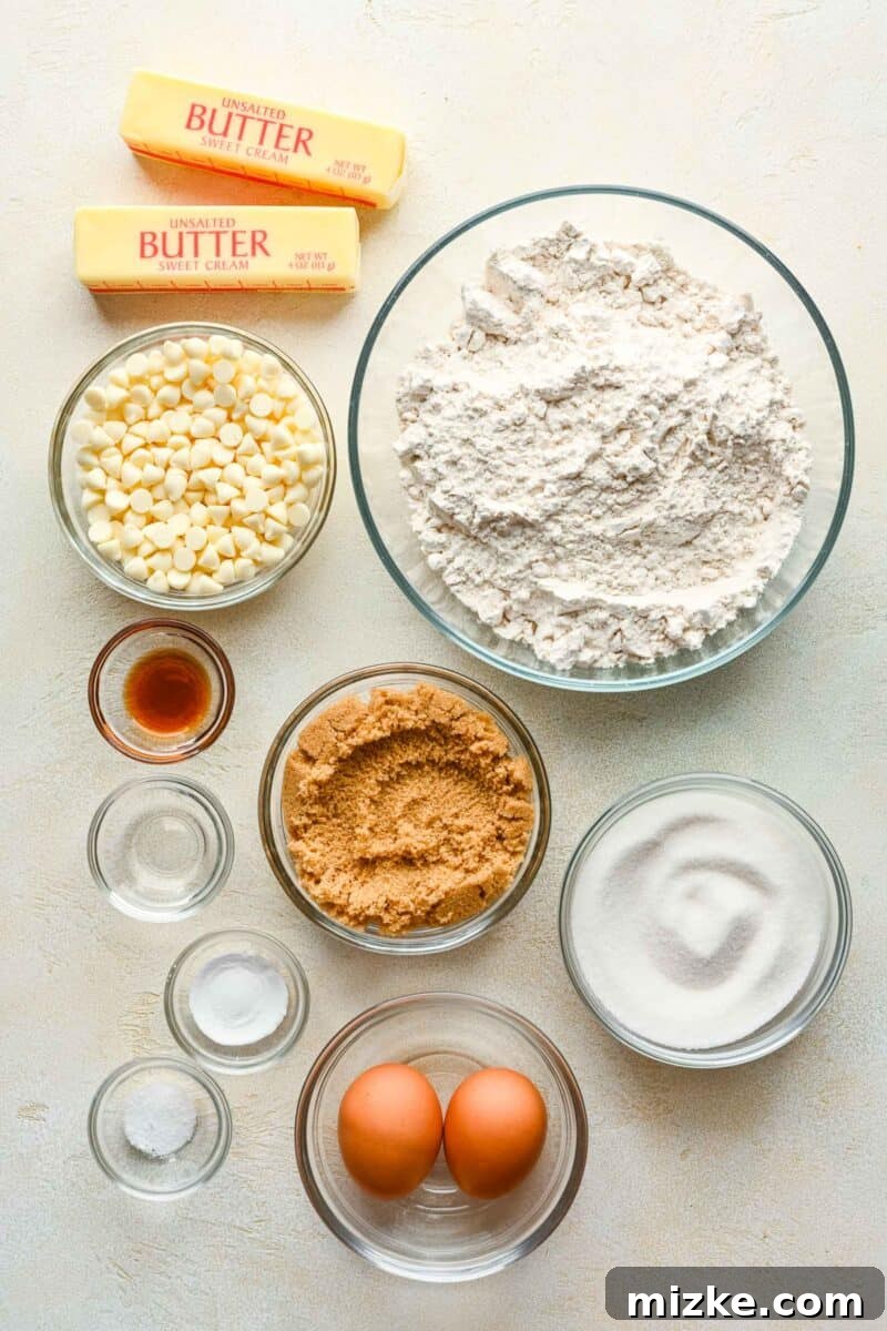 Heavenly White Chocolate Chip Cookies 3 Ingredients for making white chocolate chip cookies laid out on a kitchen counter.