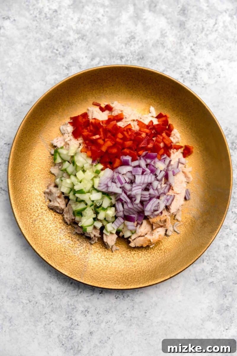 Vibrant Thai Tuna Salad 4 A vibrant serving of Thai Tuna Salad presented on delicate crostini, garnished with fresh herbs, ideal for a light appetizer or a sophisticated snack.