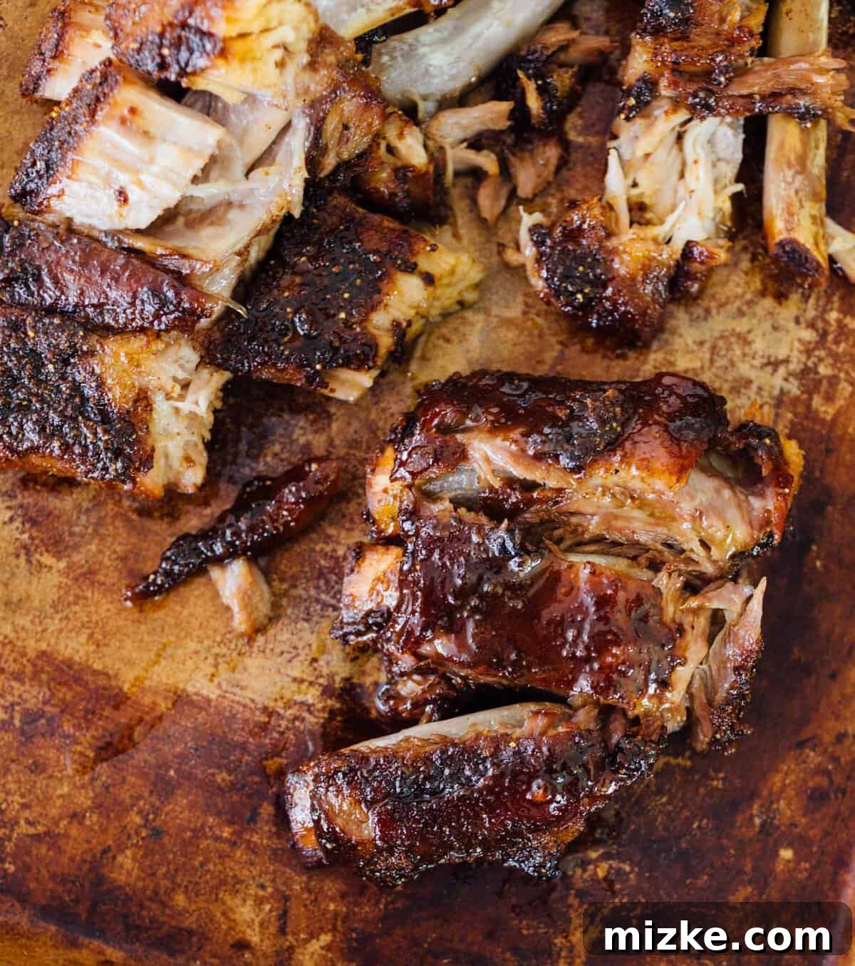 Honey Butter Ribs Ingredients Ingredients for tender oven-baked honey butter ribs, including pork baby back ribs, honey, butter, brown sugar, and a flavorful spice rub.