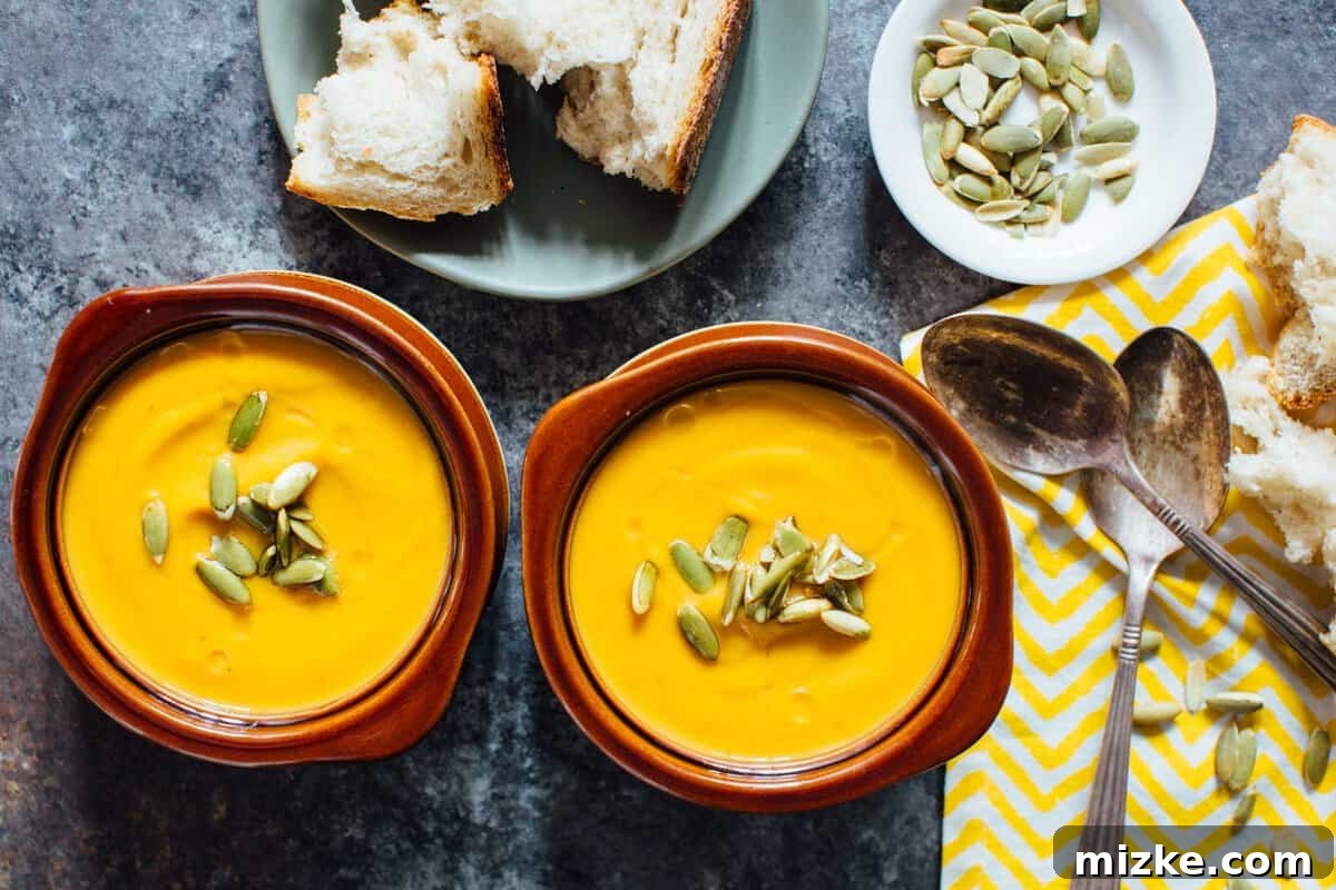 Butternut Squash Soup Ingredients Key ingredients for Instant Pot Autumn Harvest Butternut Squash Soup, including cubed butternut squash, pumpkin puree, apple juice, and cream cheese.