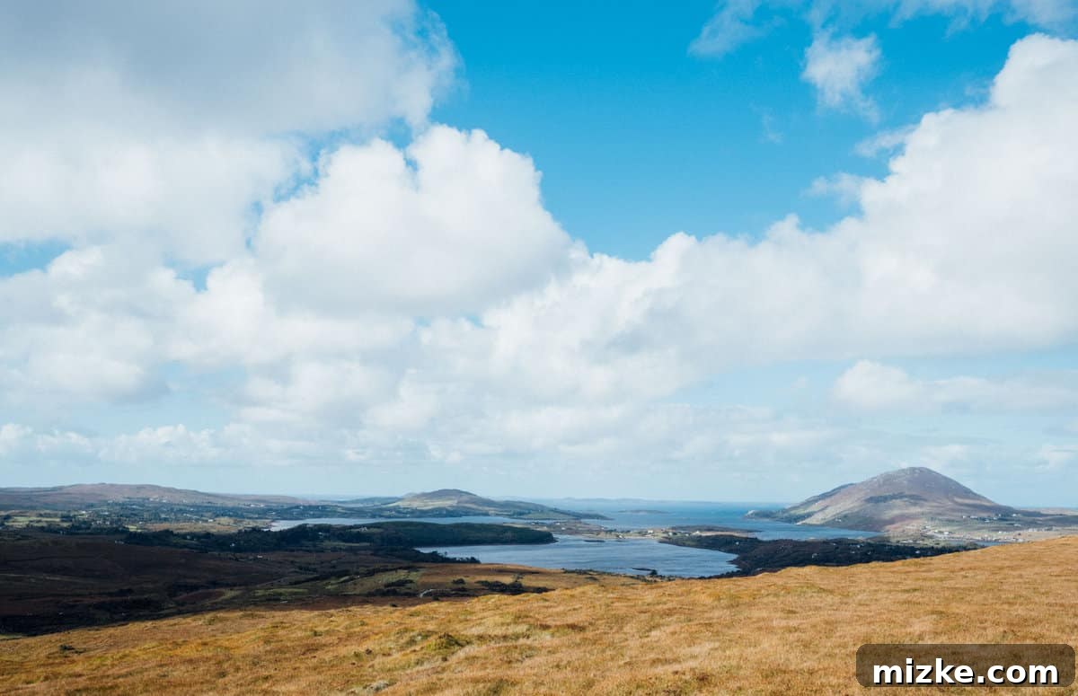 Hiking Trails and Scenic Beauty of Diamond Hill Well-maintained hiking path on Diamond Hill, Connemara National Park, with expansive views