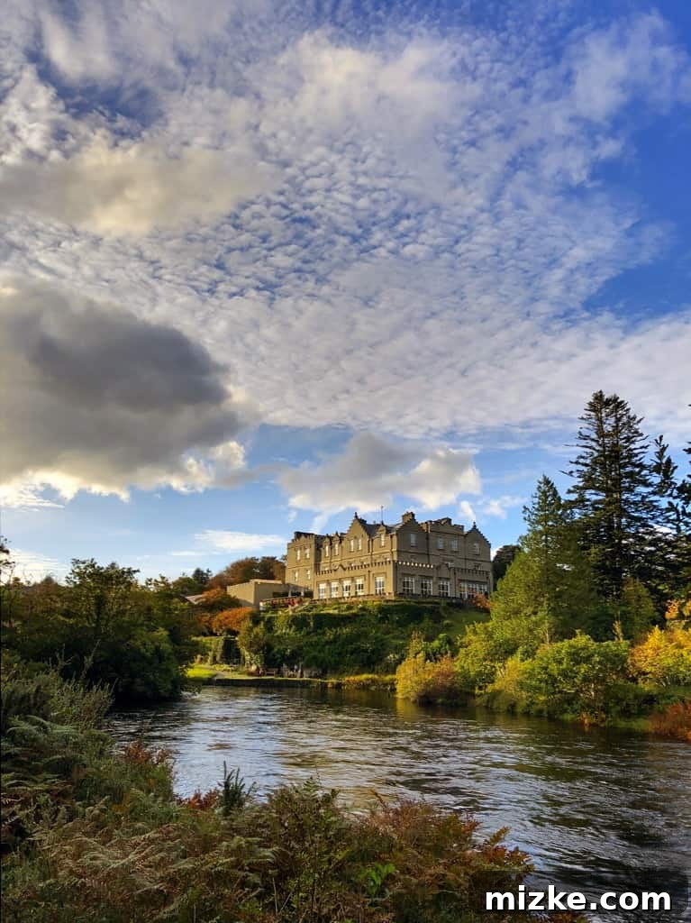 Experiencing Luxury at Ballynahinch Castle, Connemara Traveler standing in front of the historic Ballynahinch Castle Hotel in Connemara, Ireland