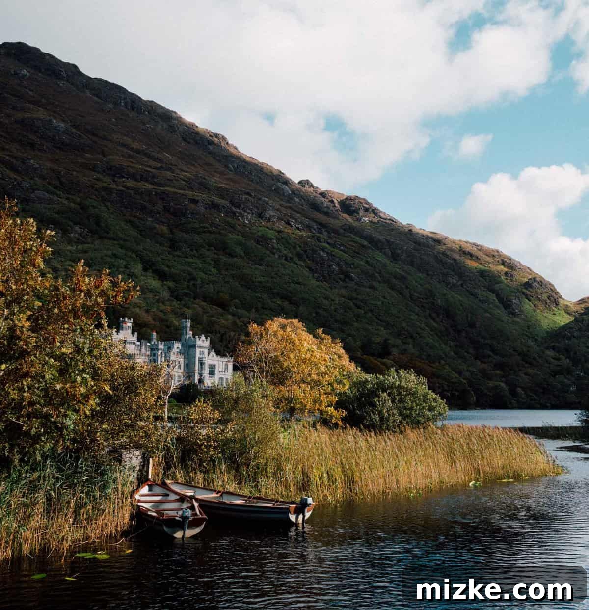 Iconic Kylemore Abbey and its Serene Lake Reflection Kylemore Abbey reflected in the lake, a stunning Victorian castle in Connemara, Ireland