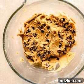 Cookie dough in a glass mixing bowl