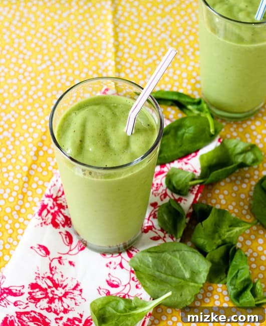 Verdant Power Smoothie 4 A vibrant green smoothie poured into a glass, ready to be enjoyed