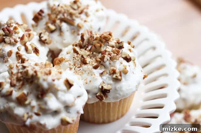 Billie Italian Delight 4 A tray of beautifully frosted Italian Cream Cupcakes, ready to be served