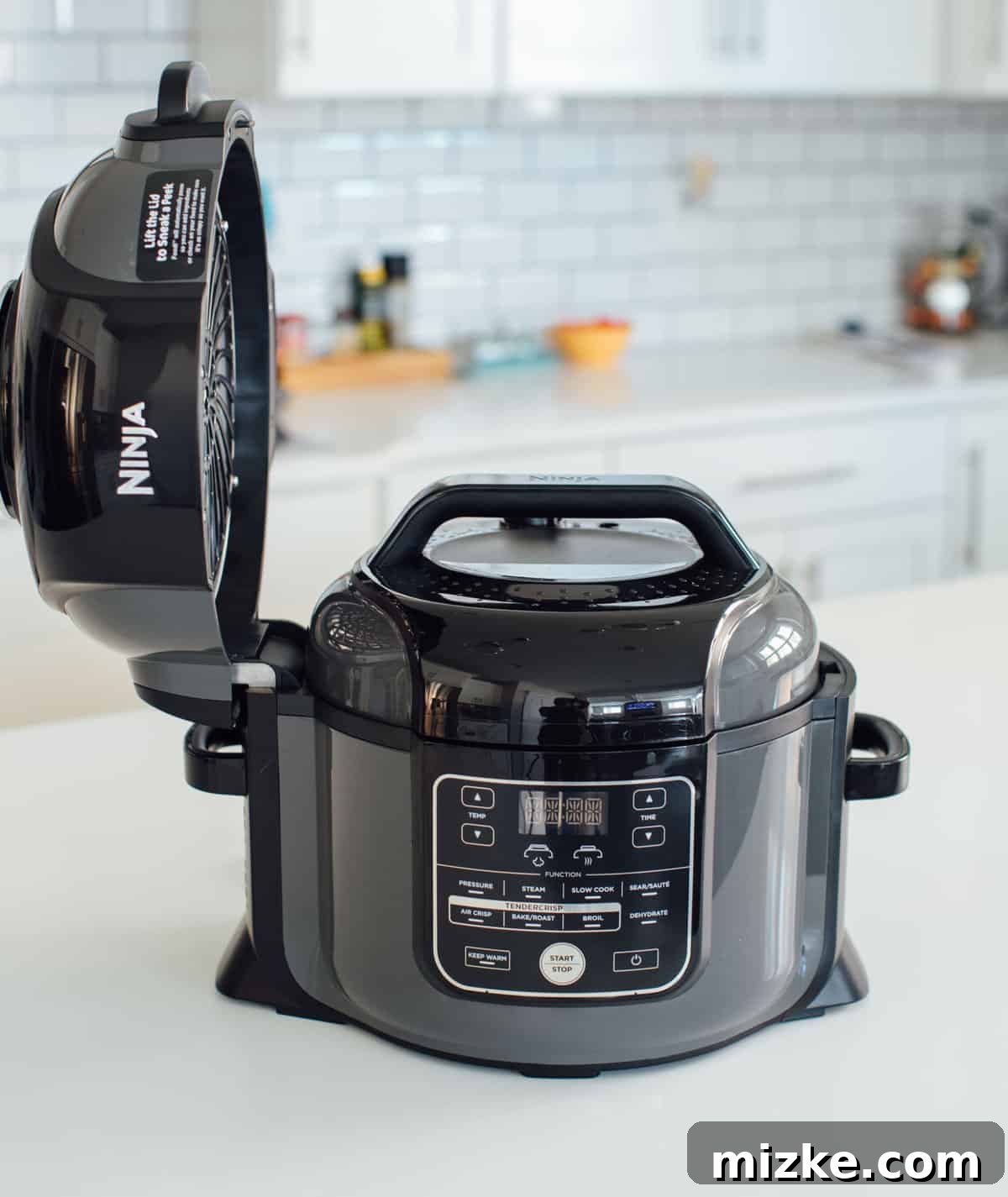 Instant Pot Versus Ninja Foodi 7 Ninja Foodi with air fryer lid open, showing its size