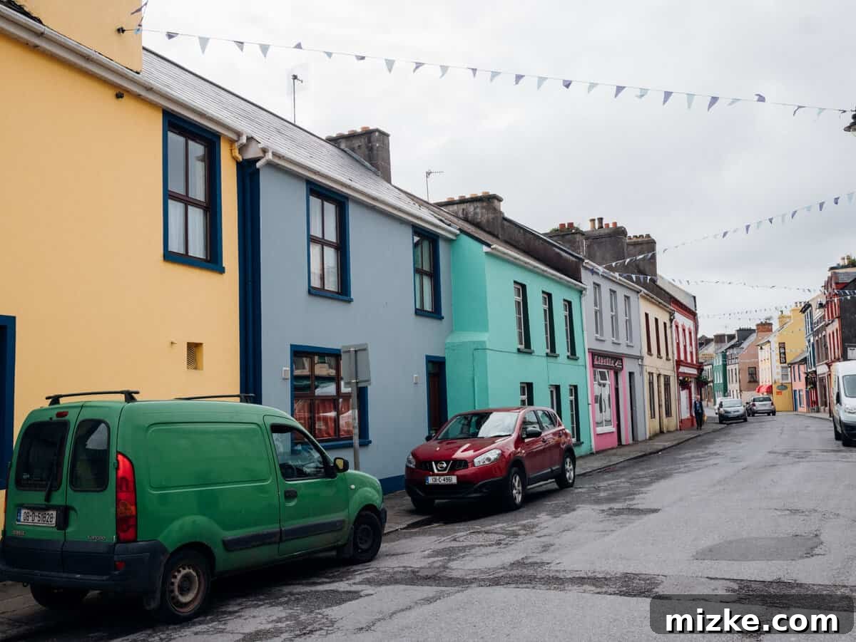 Ireland's Rugged Beara Peninsula 19 A scenic view of a quiet street or alley in Castletownbere with traditional Irish buildings