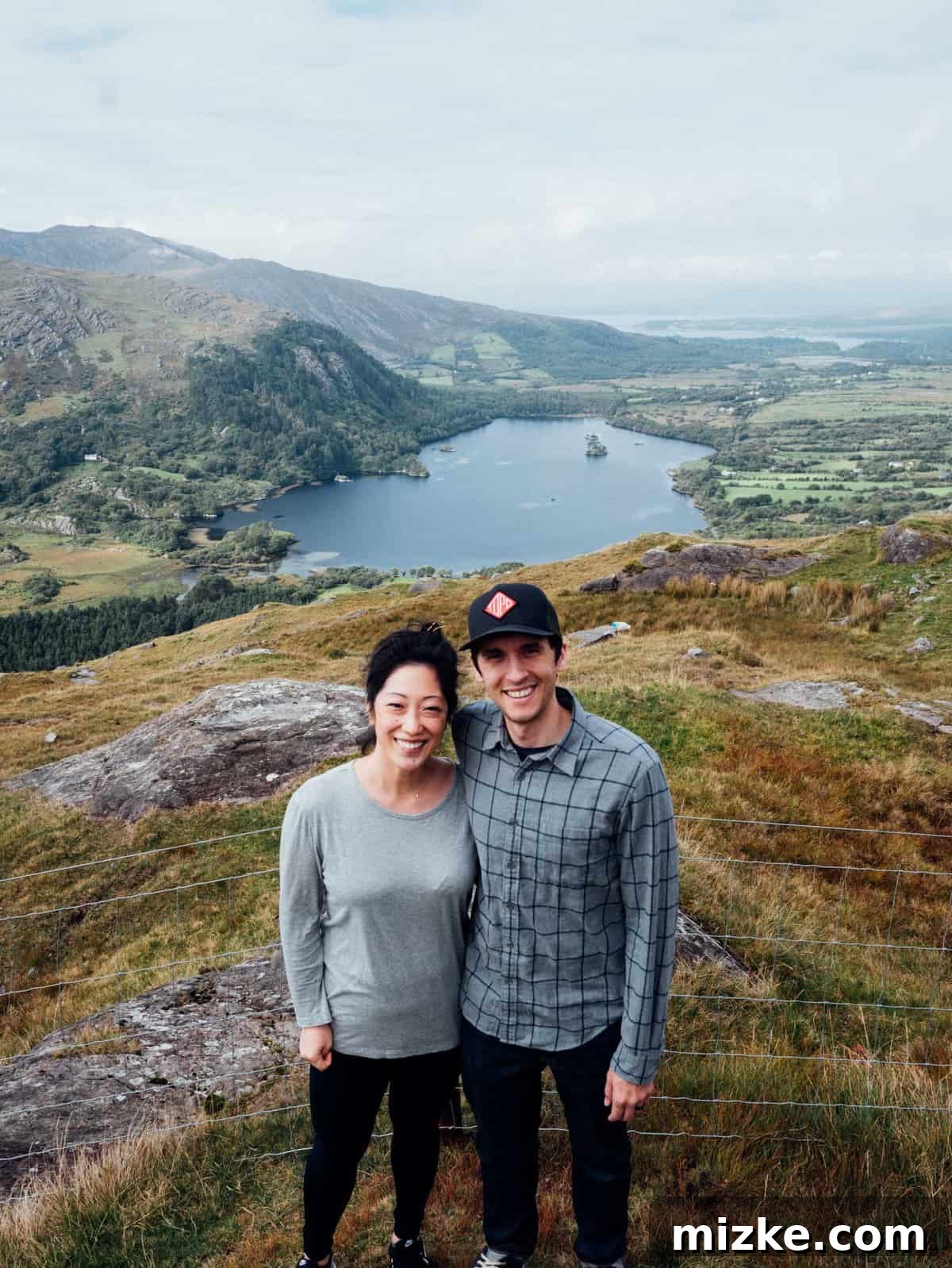 Ireland's Rugged Beara Peninsula 30 Another panoramic view of a lush valley with scattered farmhouses and fields under a clearing sky