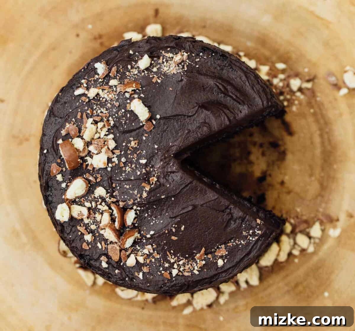 Perfect Mini Chocolate Malt Cake: Indulge Your Cravings This mini chocolate malt cake for two is perfect for any celebration or if you're just craving a chocolate cake and don't want to make a large one! A large, beautiful close-up of the mini cake.
