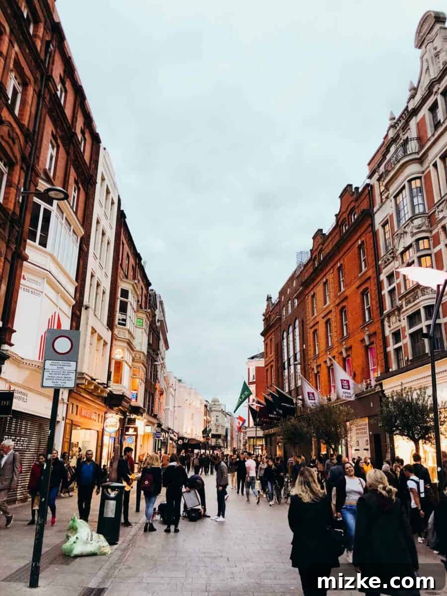 The Heart of Ireland 2 Lively street scene in Dublin with historic Georgian buildings and people walking, capturing the essence of the city's vibrant atmosphere.