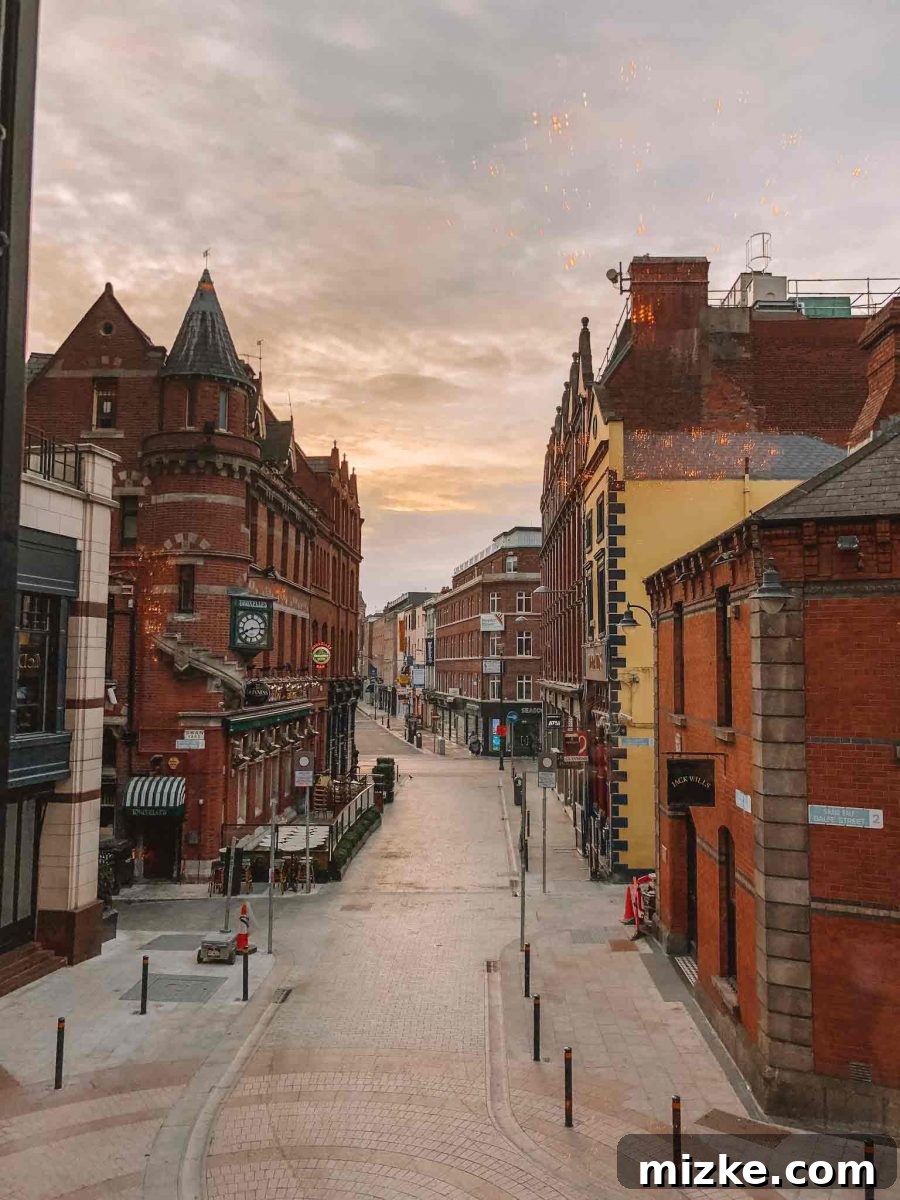 The Heart of Ireland 3 A charming street in Dublin with colorful traditional buildings and a classic Irish pub, inviting travelers to explore the vibrant city.