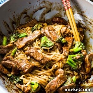 A take on the classic Chinese takeout dish but in a rice noodle dish! Super easy to make on a busy weeknight! This Asian beef and broccoli noodle dish is going to be your new favorite! #beefandbroccoli #ricenoodles #asiannoodles #asianrecipe #noodlerecipe