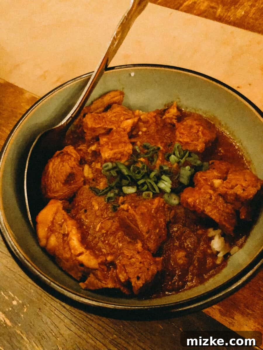 DC Date Night: True North 9 Rich Curried Lamb dish, beautifully presented on a plate