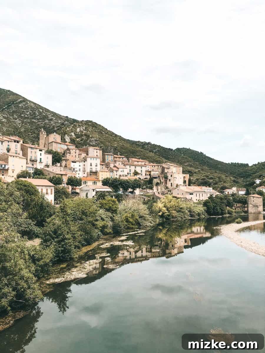 Quaint street in Roquebrun, inviting exploration of its narrow alleys and local charm.