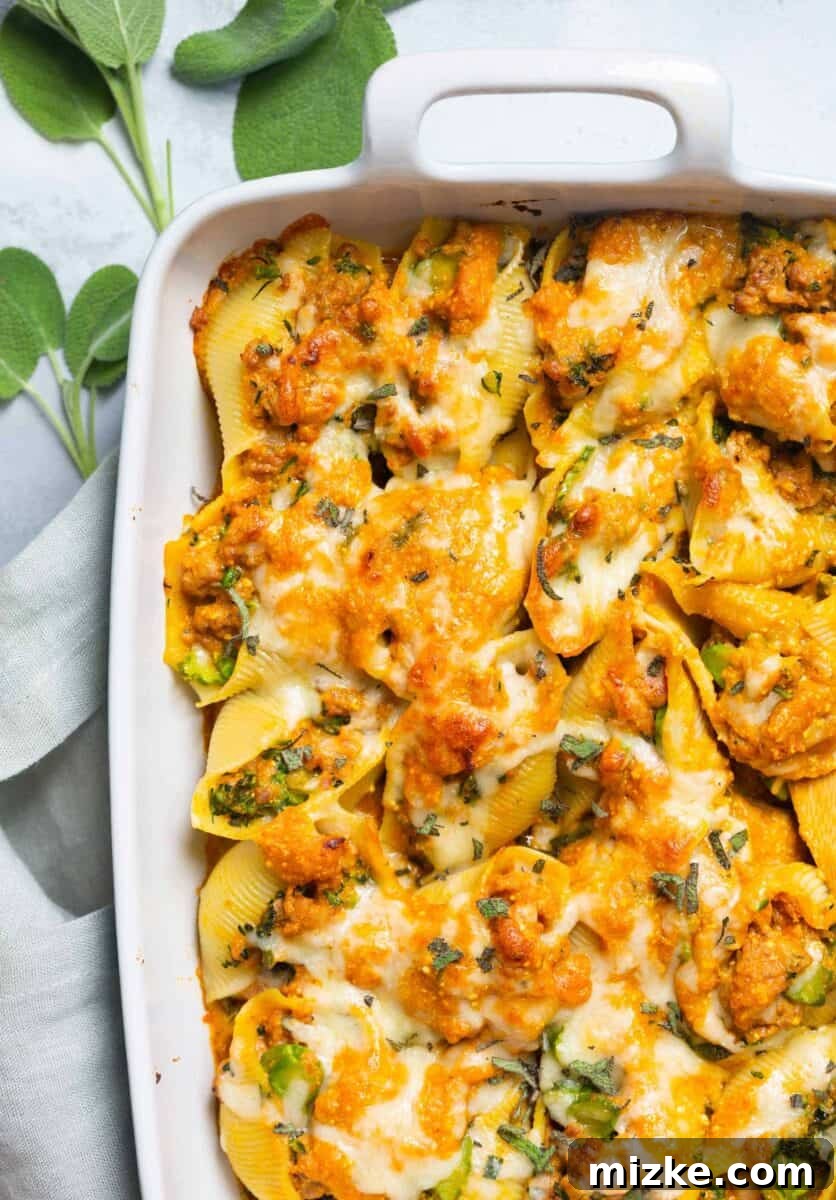Cheesy Pumpkin Stuffed Shells with Spicy Sausage and Broccolini Delicious Cheesy Pumpkin and Spicy Sausage Stuffed Shells, a perfect fall comfort food meal.