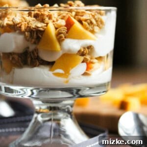 Layered Peach Parfait in a glass