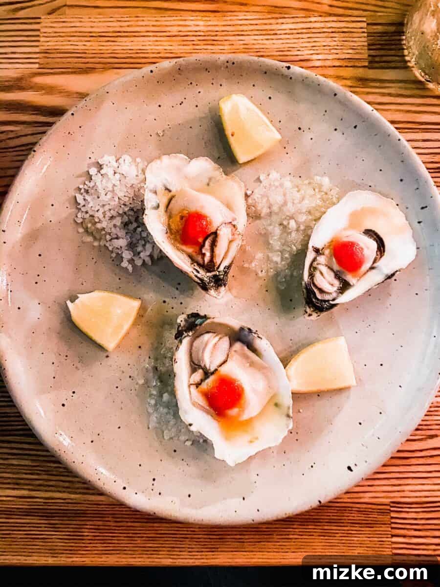 DC Date Night: Gala of Hearts 4 A beautifully arranged selection of small plates at Reveler's Hour, featuring grilled oysters and other appetizers.