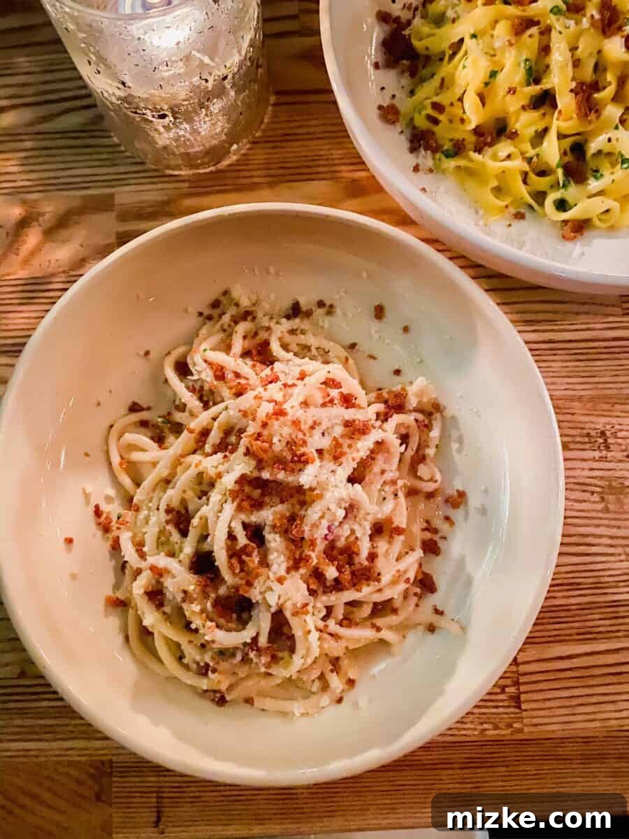 DC Date Night: Gala of Hearts 7 Two plates of Reveler's Hour's exquisite, freshly made pasta dishes, showcasing their vibrant colors and textures.
