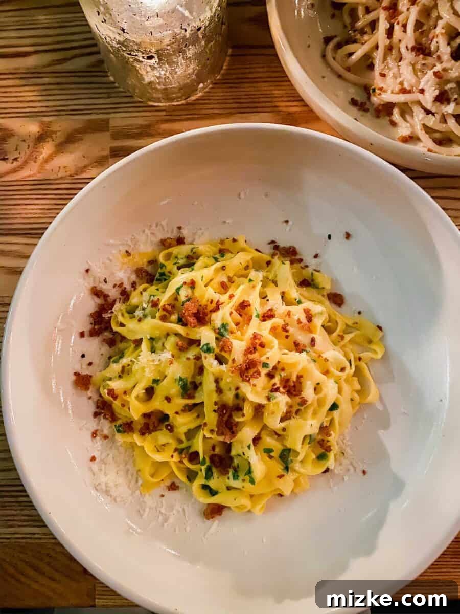 DC Date Night: Gala of Hearts 8 A close-up view of the perfectly plated tagliolini pasta at Reveler's Hour, highlighting its delicate strands and rich sauce.