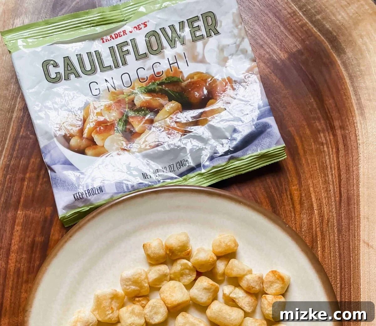Crispy Air-Fried Cauliflower Gnocchi 4 Air frying cauliflower gnocchi in an air fryer basket, showing even spacing for optimal crisping