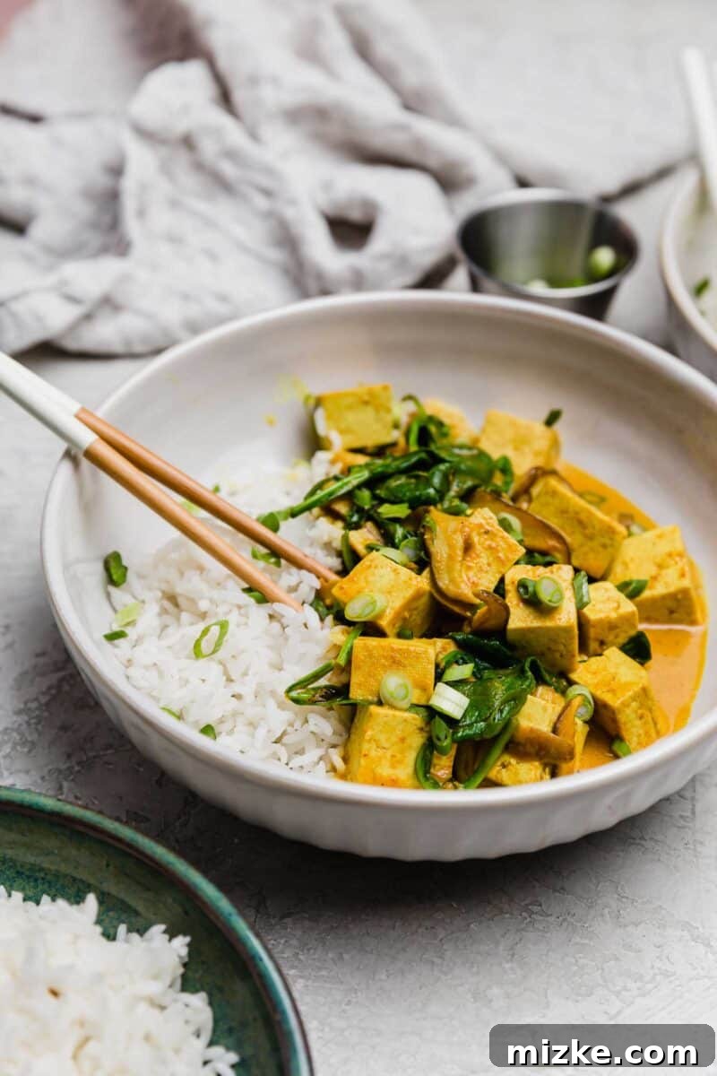 Hearty Tofu and Mushroom Curry This tofu coconut curry bowl is simmered in a deliciously warm coconut curry sauce along with shiitake mushrooms. A plant-based dinner for any evening!