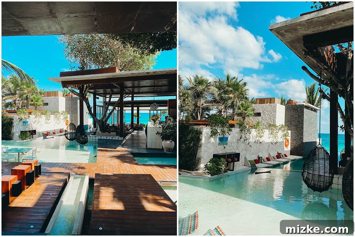 Tulum Vibes with My Tribe 3 Two women enjoying cocktails by the ocean at a luxury resort in Tulum, Mexico.