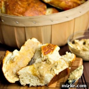 Homemade Pretzel Baguette with Mustard Butter, sliced and ready to serve
