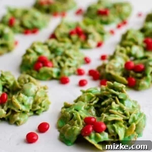 red hots are scattered across a batch of wreaths