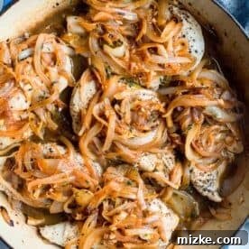 French Onion Smothered Chicken 8 chicken is added back into the dutch oven and caramelized onions are topped on the chicken