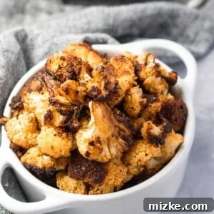 Close-up of the finished Crazy Roasted Cauliflower, golden brown and perfectly charred.