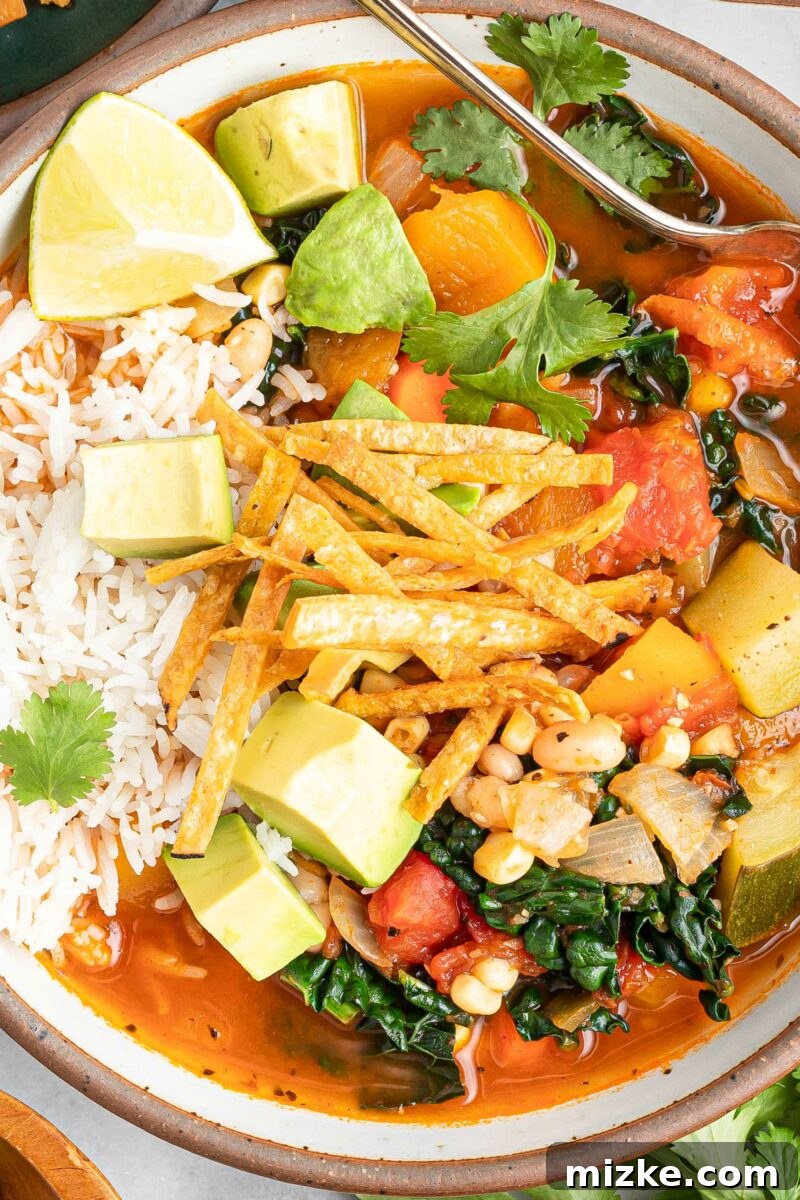 Zesty Mexican Veggie Bean Tortilla Soup 5 A close up show shows all of the ingredients of the soup in detail.