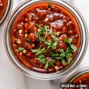 A delectable close-up of Great Grandma's Pasta Sauce, rich and ready, promising an authentic Italian dining experience.
