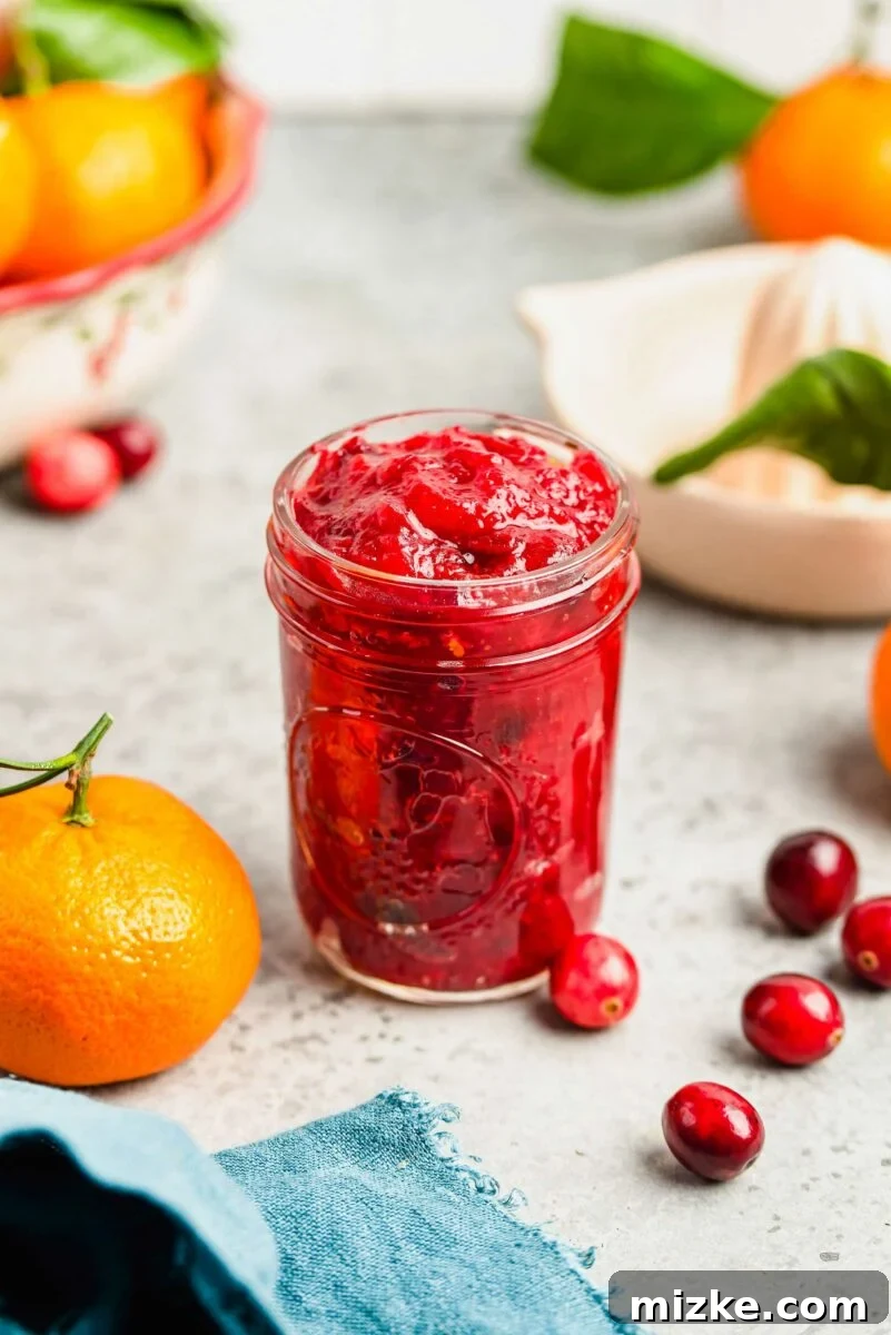Store your homemade cranberry orange sauce in charming mason jars for an appealing presentation and easy gifting. cranberry orange sauce in a mason jar, for gifting or storage