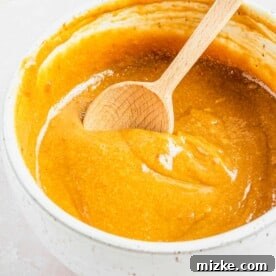 Refreshing Chicken & Veggie Rolls 6 A bowl of peanut dipping sauce with a spoon.