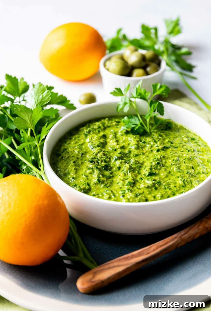 Vibrant Meyer Lemon Green Olive Gremolata 2 A small white bowl is filed with green gremolata.