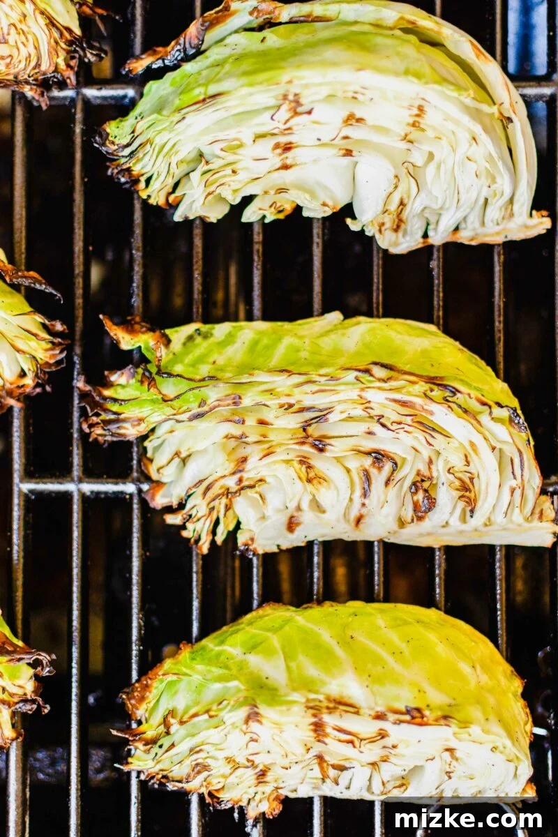 Cabbage wedges are being grilled. 