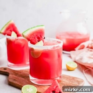 Watermelon Paloma cocktail with a slice of watermelon.