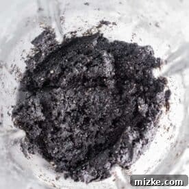black sesame paste inside a glass blender jar
