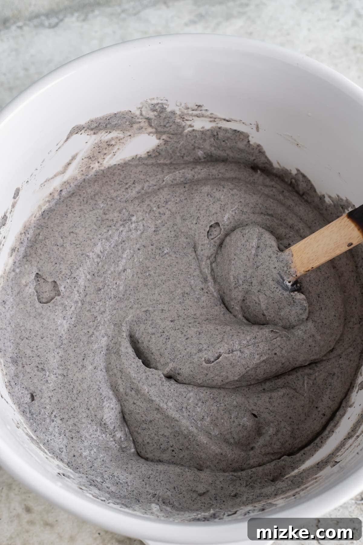 Midnight Sesame Dream 8 black sesame ice cream mixed together in a bowl