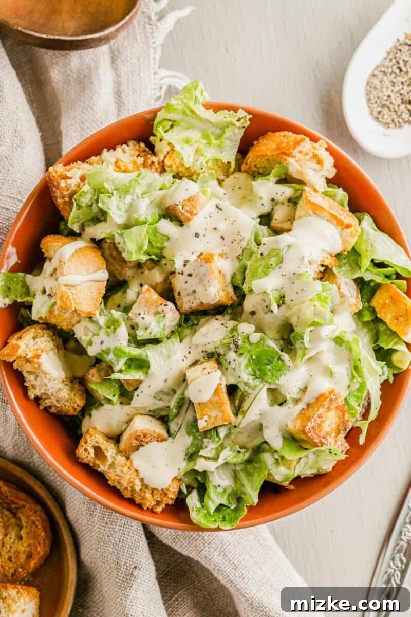 Plant-Based Caesar Salad 2 A beautifully presented vegan Caesar salad with crispy croutons and a creamy dressing.