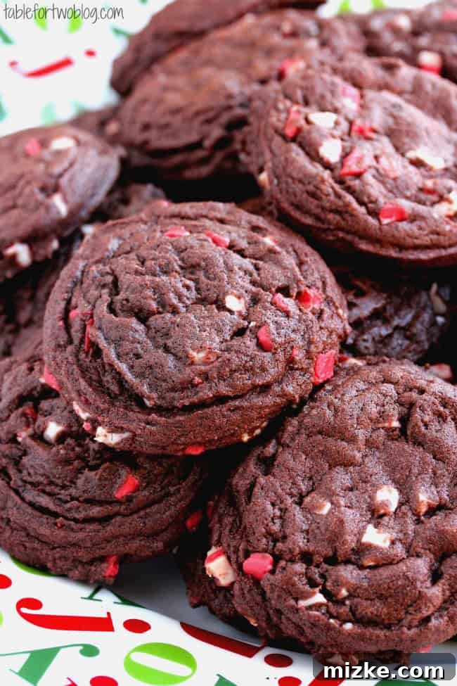 Mint Chocolate Chip Holiday Bites 4 A stack of soft and chewy Chocolate Peppermint Chip Cookies, perfect for holiday gifting or sharing.