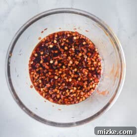 General Tso's sauce mixed together in a glass jar