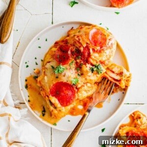 A delicious pizza stuffed chicken breast, ready to be served.