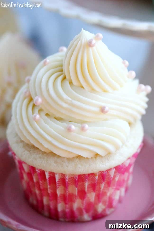 Bridal Bliss Cupcakes 4 Assortment of white wedding cake cupcakes on a platter, ready for guests