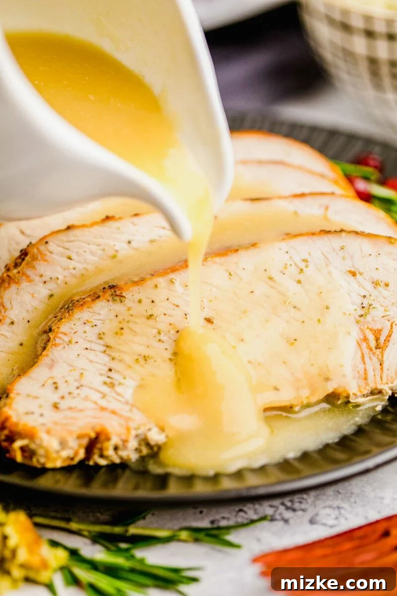 Perfect Instant Pot Turkey Breast 12 Generously pouring homemade turkey gravy over succulent slices of Instant Pot Turkey Breast, enhancing its rich flavor.