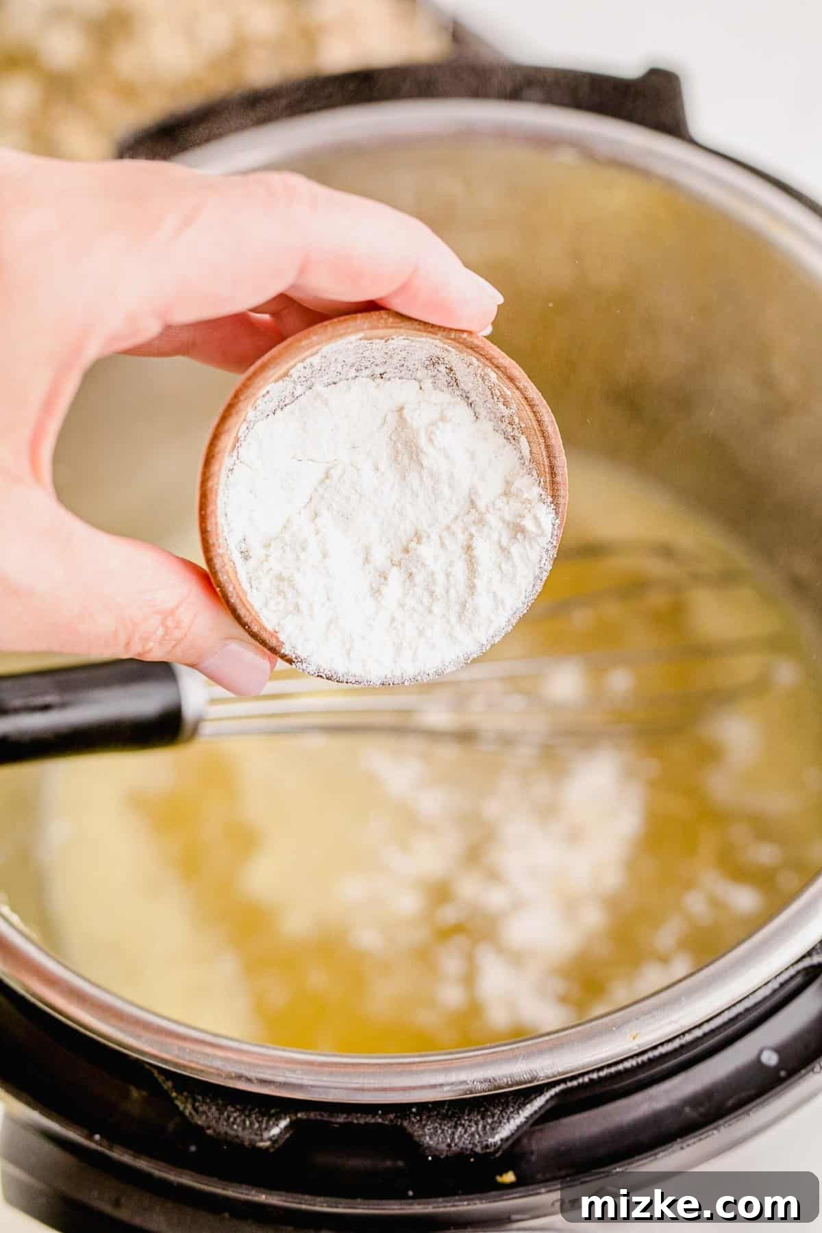 Perfect Instant Pot Turkey Breast 10 Sprinkling flour into the rich turkey drippings mixture, while whisking to create a smooth roux for the gravy.