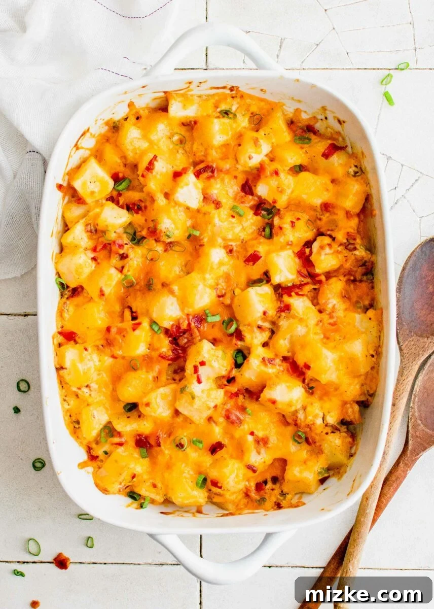 Loaded Potato Dream Bake 2 Baked potato casserole is topped with bacon bits and sliced green onions.